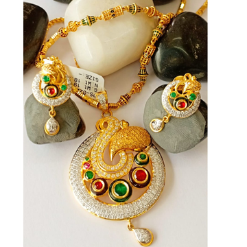 Attractive 22 kt gold pendant set with red-green k...