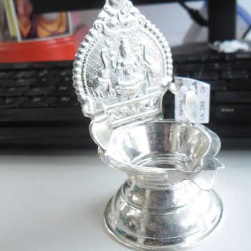 Silver kamakshi  ( two side lakshmi embossed) with... by 