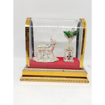 Silver Cow and Tulsi pot by Rajasthan Jewellers Private Limited
