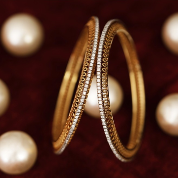 18kt diomand bangle by 