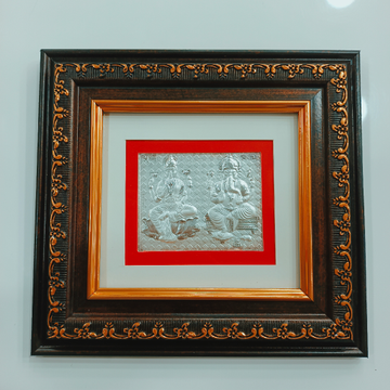 Laxmi ganesha 999 silver frame by Ghunghru Jewellers