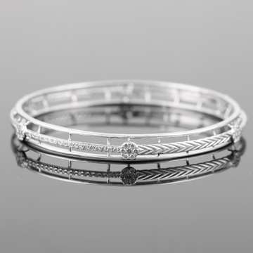 18kt white gold designer diamond bangle  by 