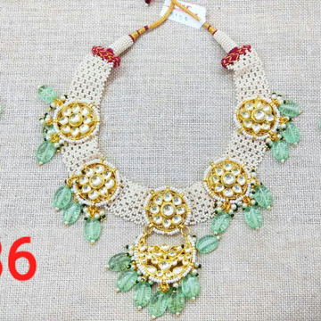 Necklace With Green Beads And Flower Design