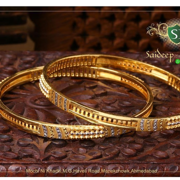 Gold grand bangles by Saideep Jewels