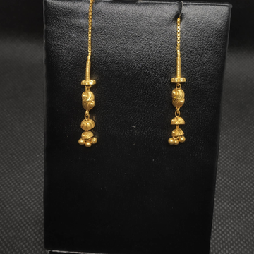 Gold earrings by S.P. Jewellers