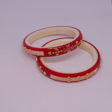 red and white plastic bangles by Rangila Jewellers