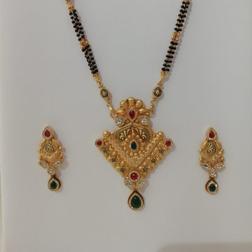 916 gold fancy green stone and antique jadtar long... by 