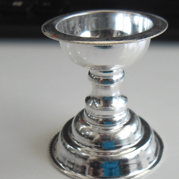 silver  round shape small diya use daily pooja by 