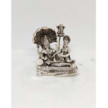 Antique silver Lord Vishnuji and Lakshmiji by Rajasthan Jewellers Private Limited