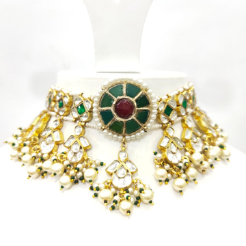 Round shape emerald and ruby stone with kundan and...