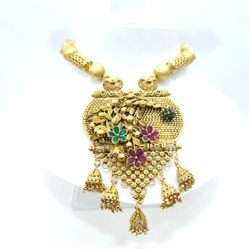 Gold plated full flower design with emerald and ru...