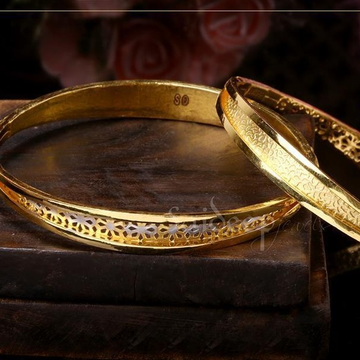 Gold trending bangles by Saideep Jewels