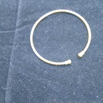 gold and silver bangle by 