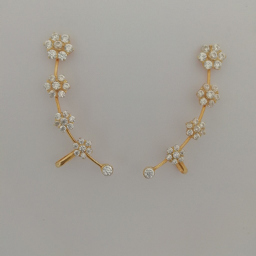 Gold white stone fancy well design earrings by 