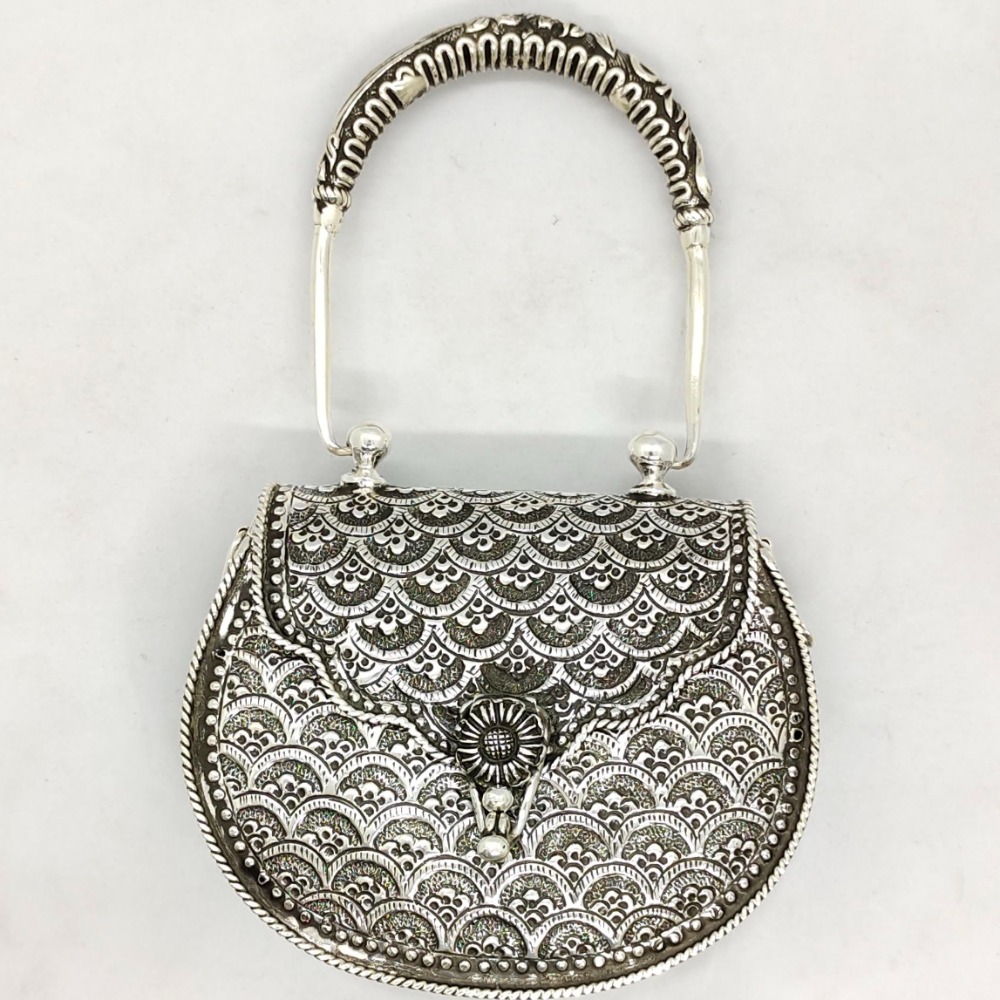 real Silver hand bag in Fine Carvings and Studded with handle