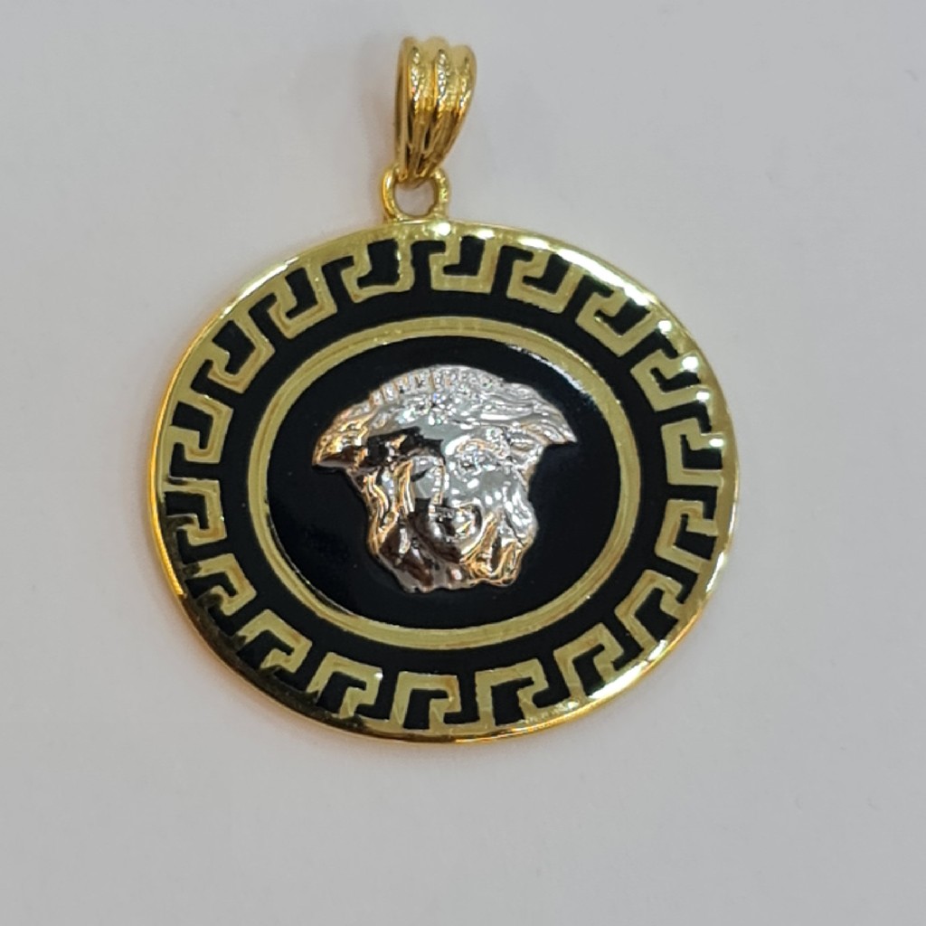 18 kt hallmark gold pendant