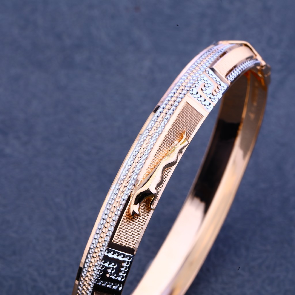 Rhodium and gold plated mens kada with jaguar design on one side and  dotted rhodium design on other  Fashion Jewellery