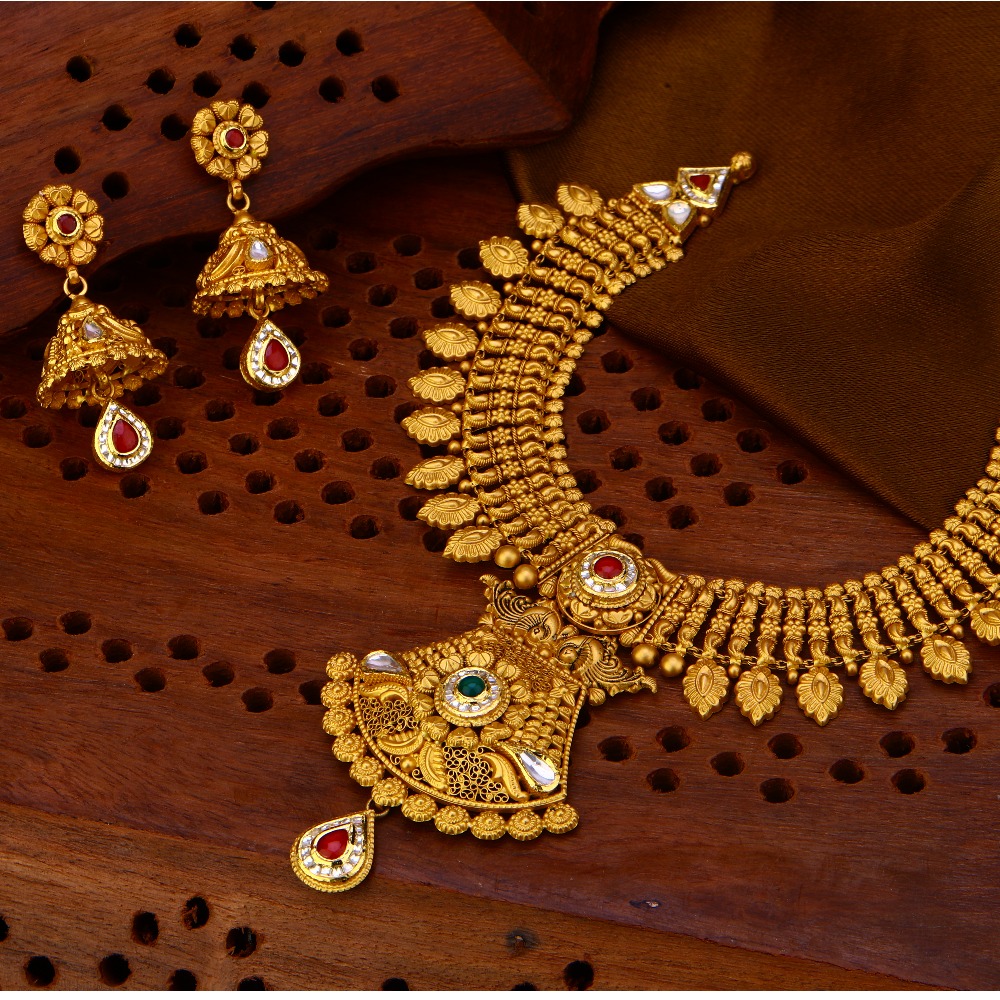 Buy quality fancy latest collection gold necklace set in Ahmedabad