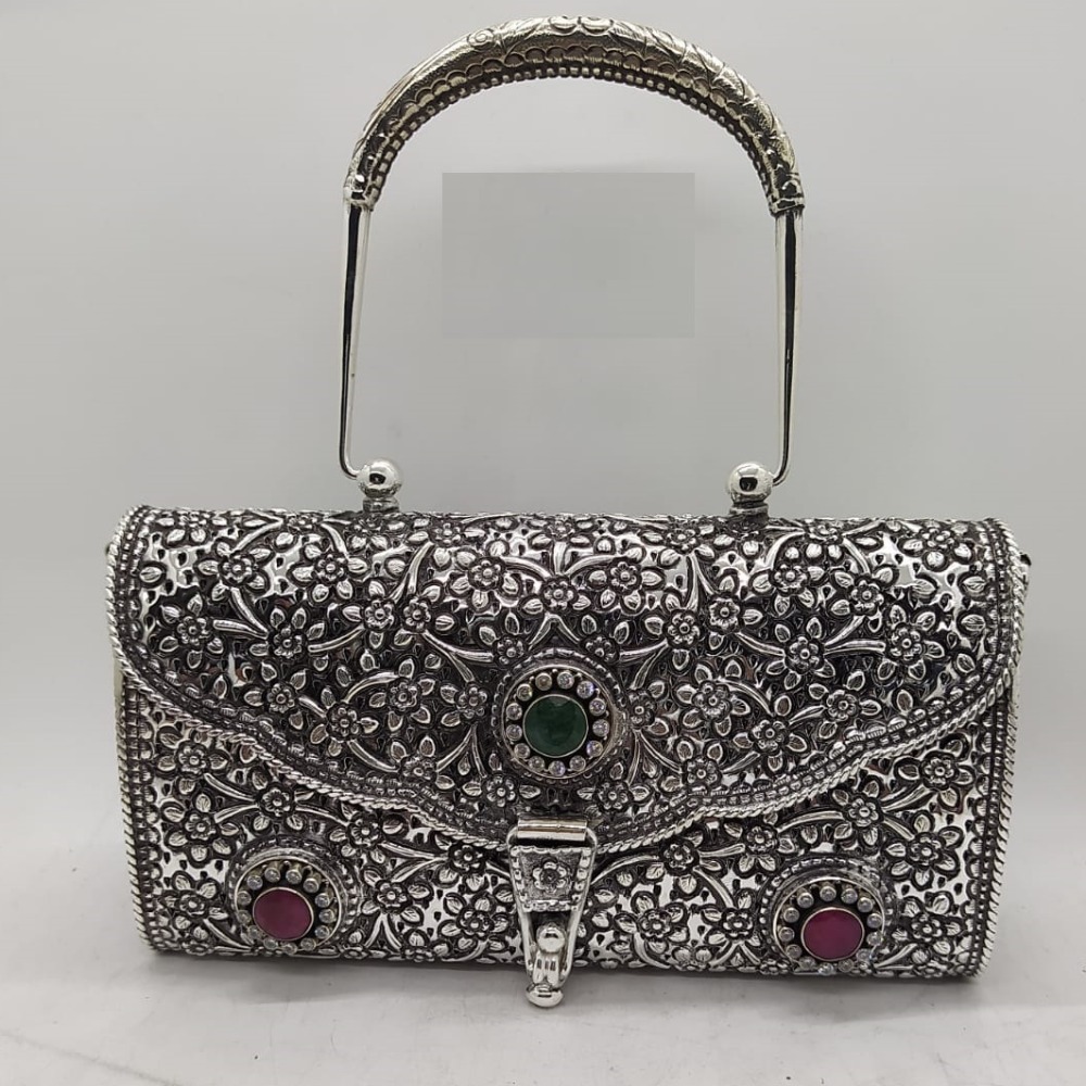blissful floral motifs with gemstone hand bag in pure silver by puran