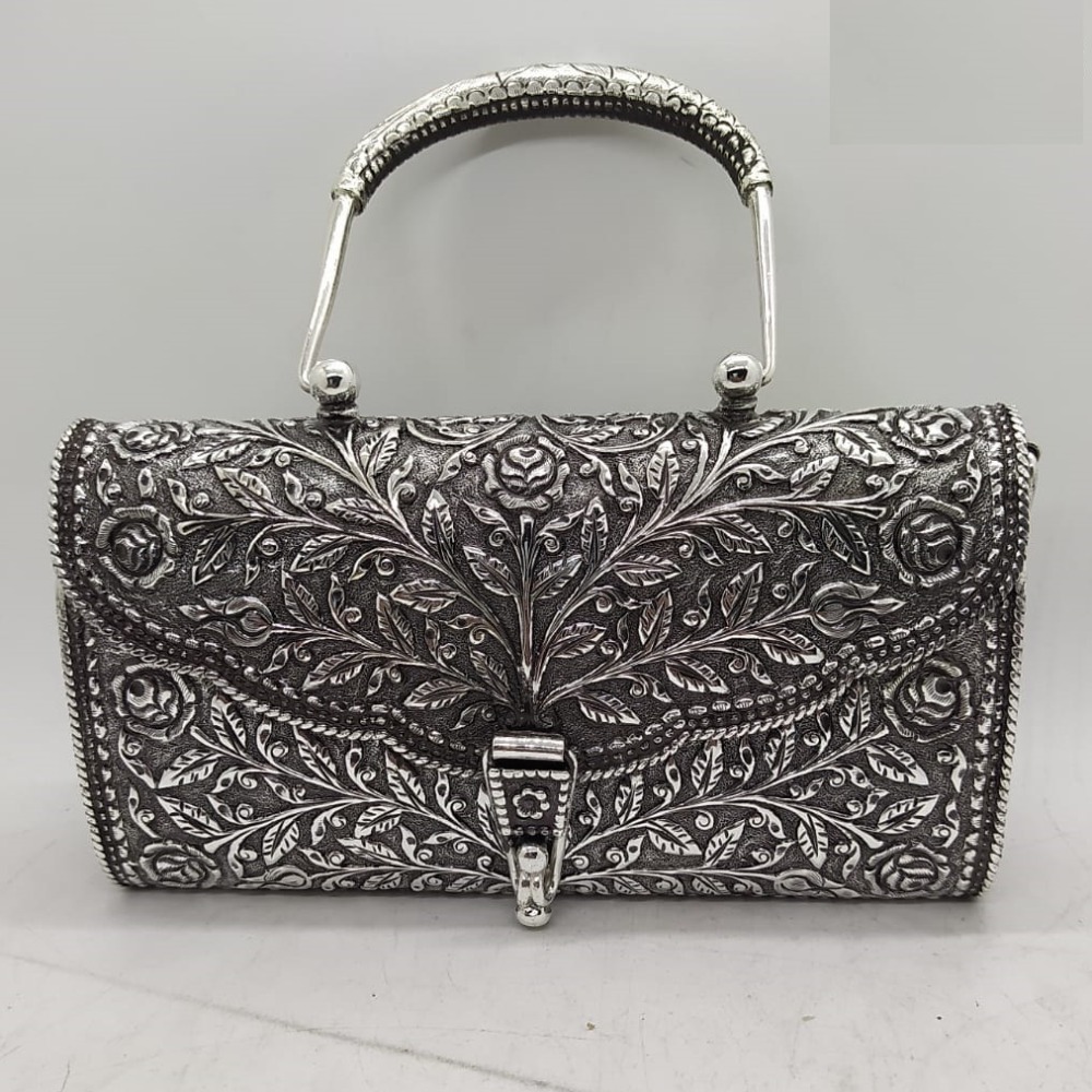 puran 925 pure silver handicraft handbag in fine nakshii work.