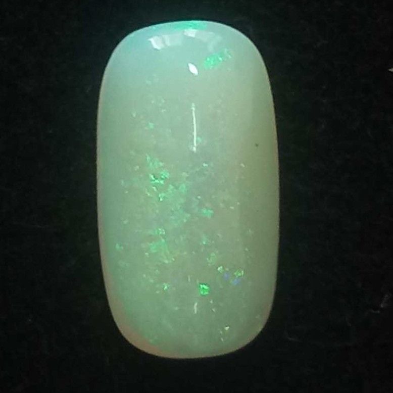 5.44ct oval multicolored opal