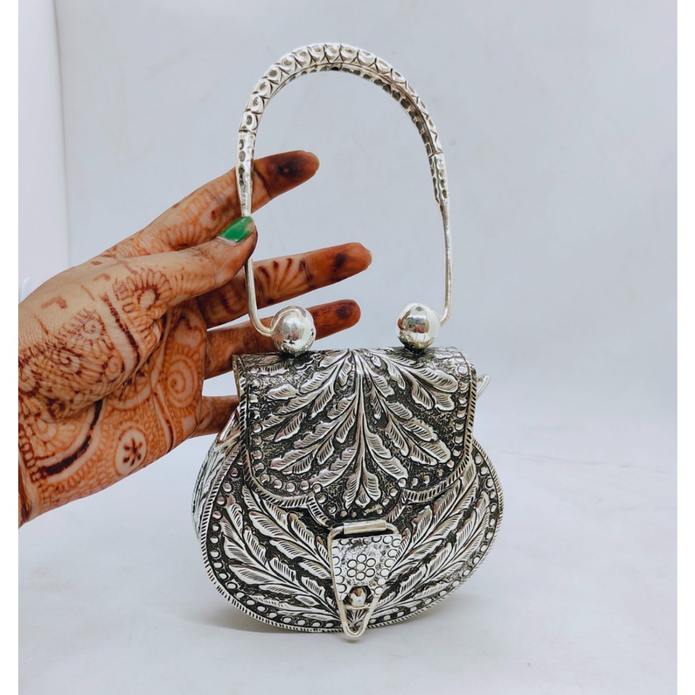 Buy quality Pure silver hand bag in fine carvings and stud with designer handle in New Delhi