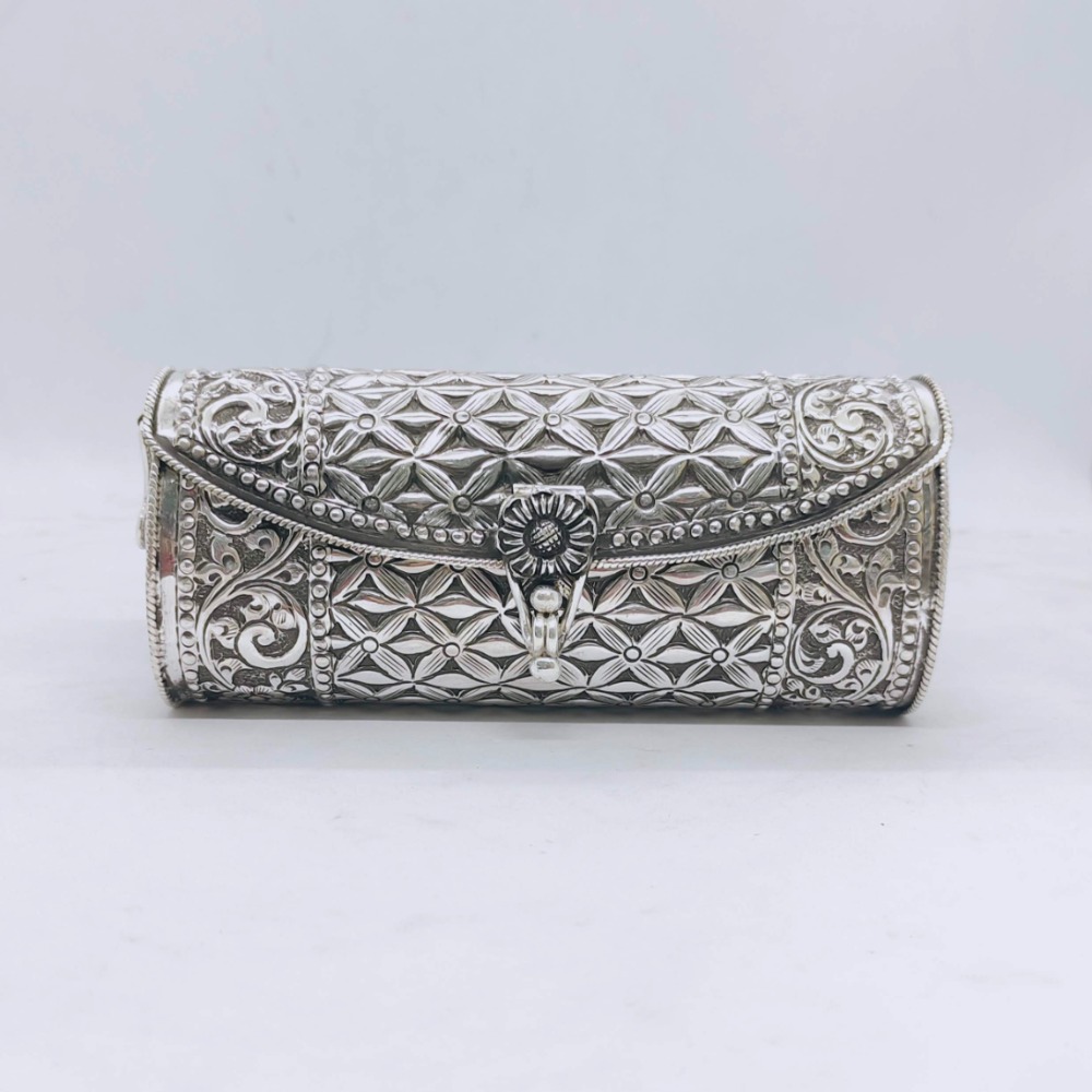 Hallmarked silver designer clutch in floral motifs carvings