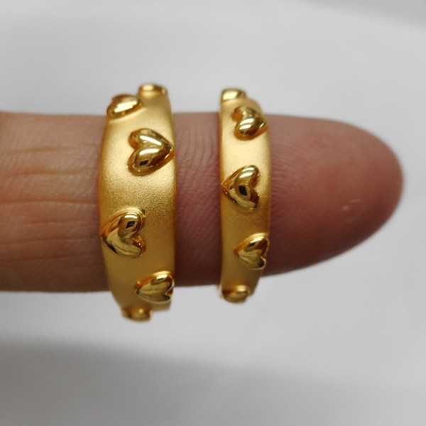 22 kt gold casting fancy couple rings