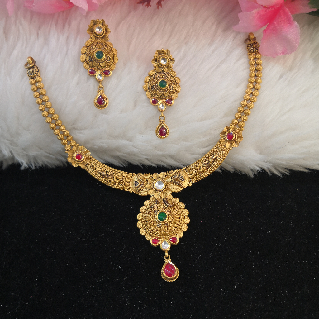 916 gold fancy antique jadtar red and green colour stone short set