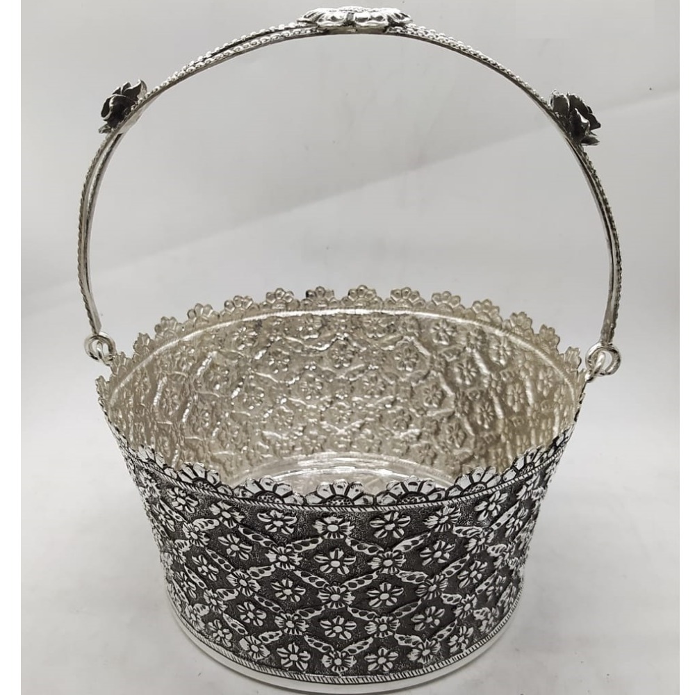 floral basket with stylish handle in fine carving by puran.