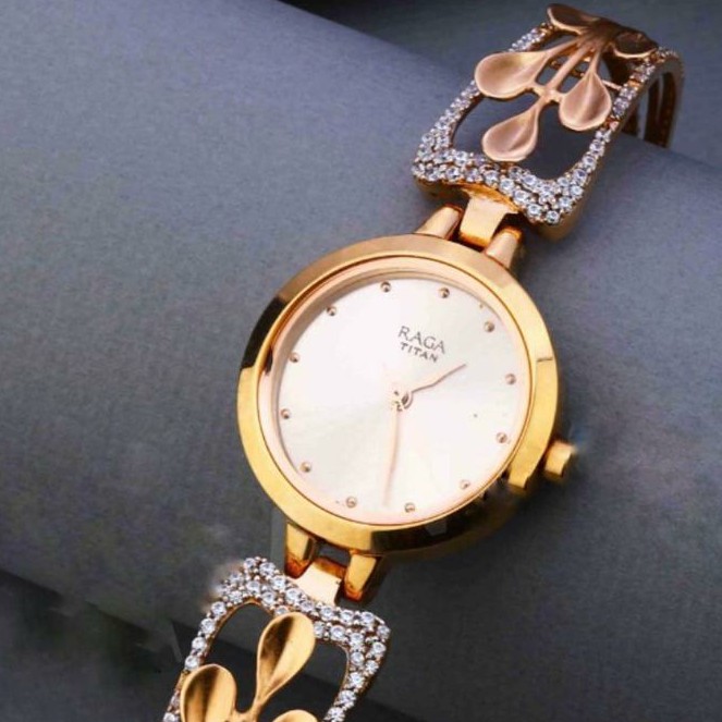 18KT Rose Gold fancy round dial watch for ladies