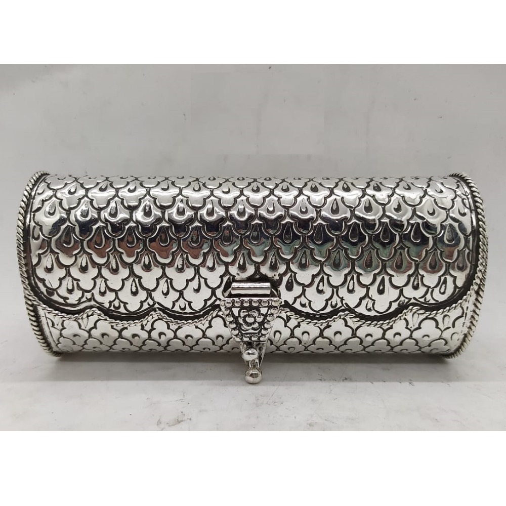 Puran pure silver clutch in mesh tile carvings