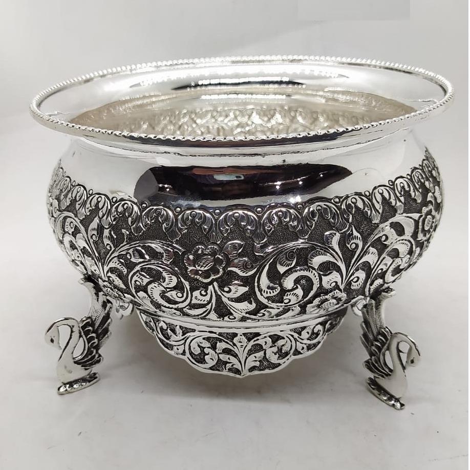 puran pure silver royal fruit bowl with peacock base in fine carving.