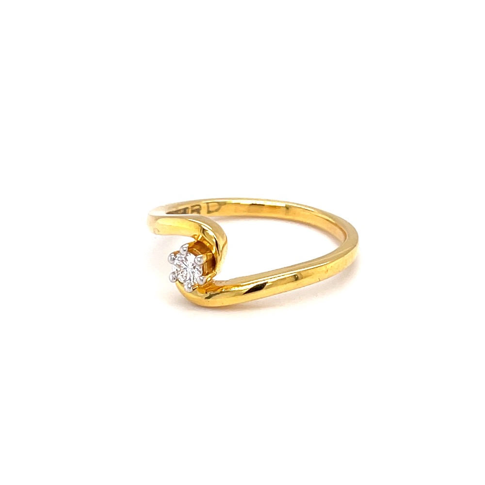 Single diamond engagement ring with cross band in yellow gold
