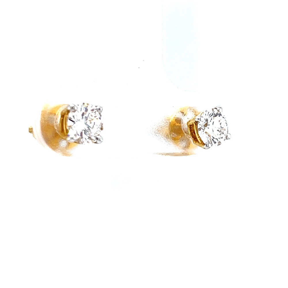 Single diamond studs in four prongs in yellow gold 0top160