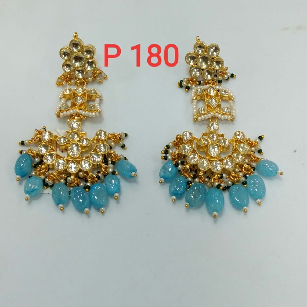 beautiful earrings with blue beads nd diamomds