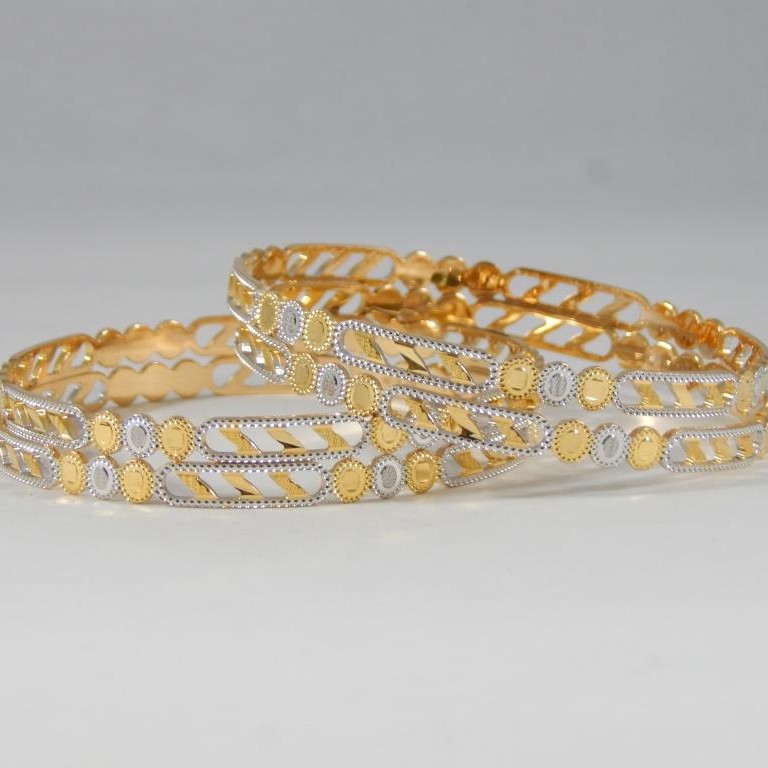 Buy quality 22Kt Yellow Gold Ojasvi Twister Bangles For Women in Ahmedabad