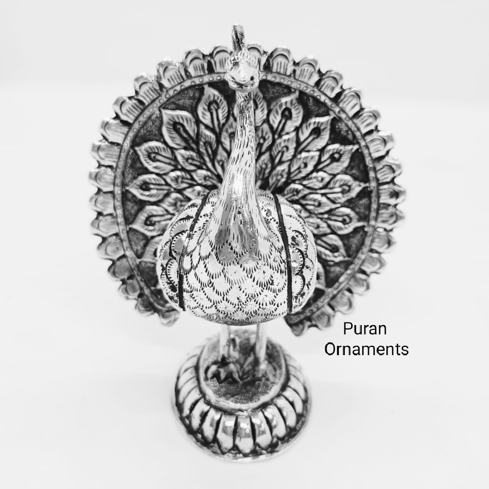Pure silver peacock idol in high finishing antique design
