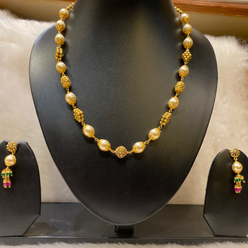 Antique Malas with tops by 